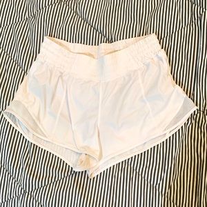 Gently used size 6 white lululemon high rise 2.5 inch inseam hotty hot shorts